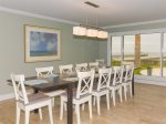 The dining room table seats up to 12 people and has breathtaking views of Copano Bay